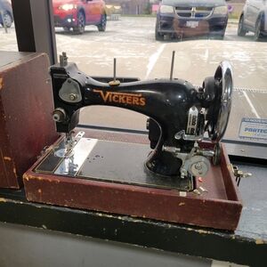 Vintage Vickers hand crank antique sewing machine with case